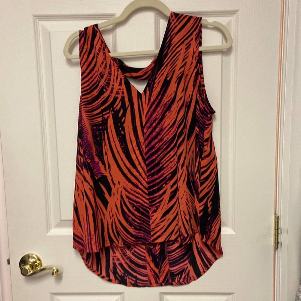 High low sleeveless blouse